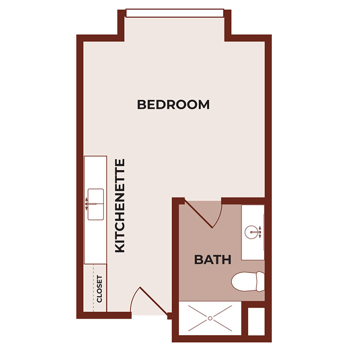 A simple floor plan shows a bedroom with a kitchenette along one wall, a closet near the entrance, and a separate bathroom with a toilet, sink, and shower.