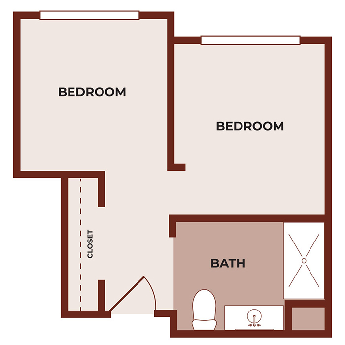 Floor plan of a two-bedroom apartment with one bathroom. The layout includes two labeled bedrooms, a closet near the entrance, and a bathroom with a toilet, sink, and shower.